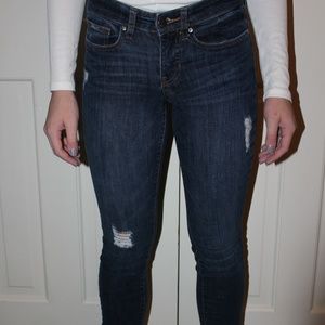 Gap blue skinny jeans with artful rips